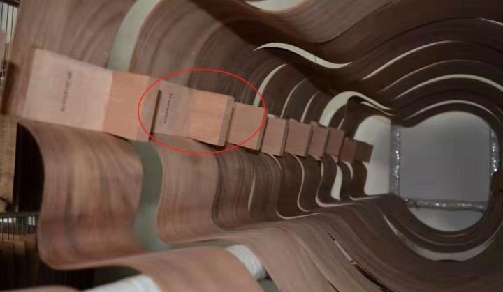Inverted L-shaped head block for acoustic guitar
